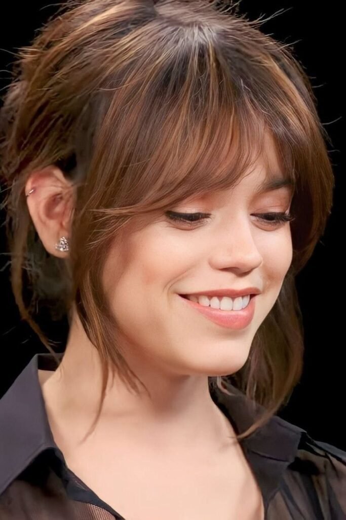 12. (Messy Casual Updo with Layered Piecey Fringe and Tendrils)