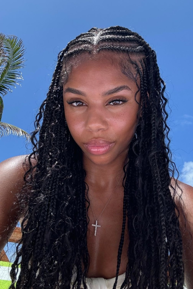 10. Middle-Part Boho Braids with Loose Curly Tendrils