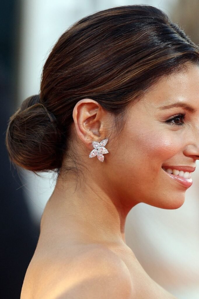 10. Sleek Low Ballerina Bun with Smooth Parting