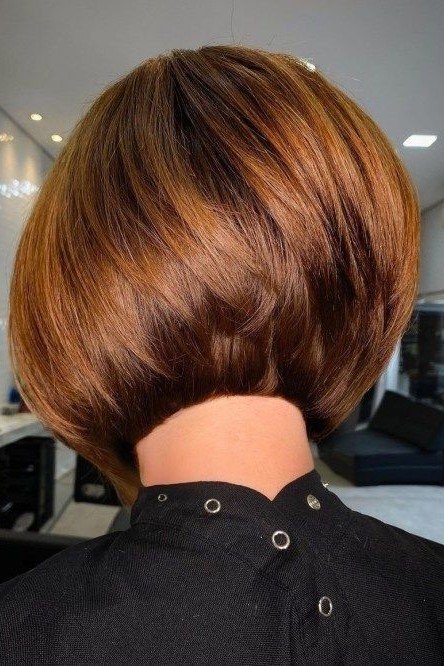 10. Smooth Auburn Copper Curved Stacked Bob Cut
