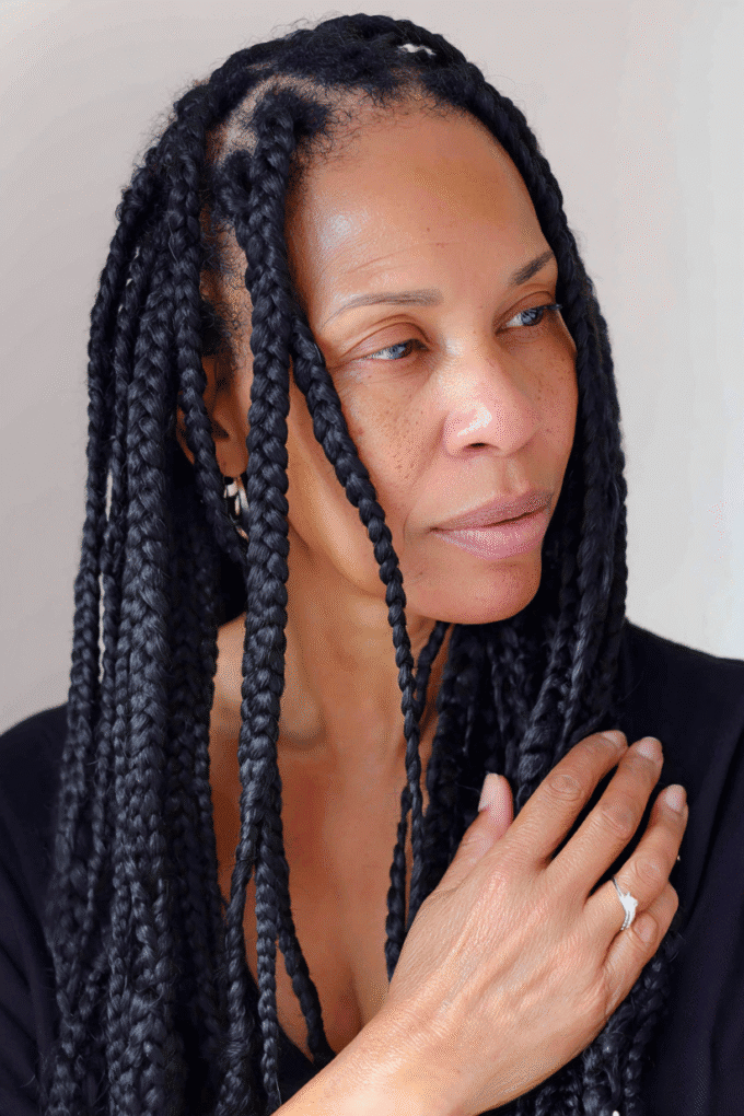 11. Sleek Straight-Back Cornrows with Long Braided Ends