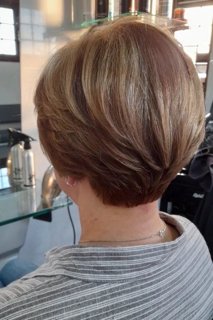 11. Soft Layered Ash Blonde Stacked Bob with Tapered Nape
