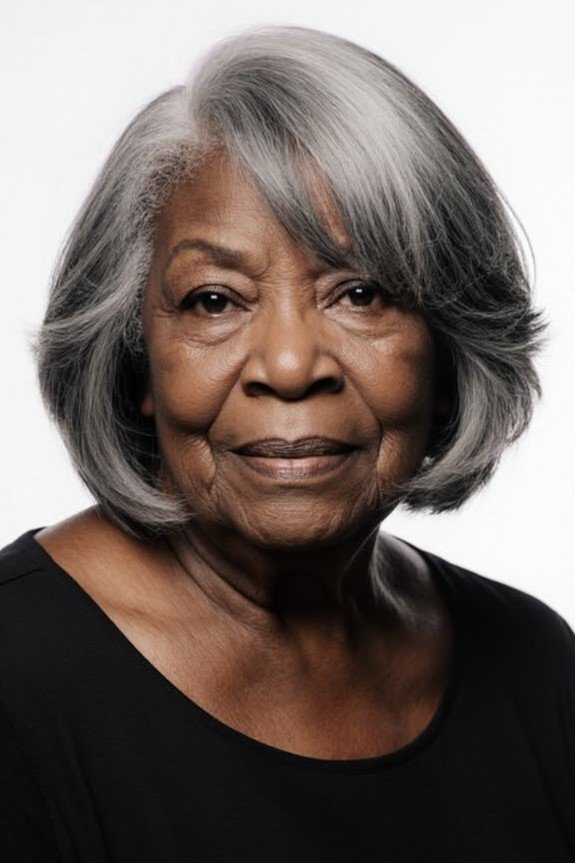 11. Soft Layered Silver Bob with Side-Swept Fringe