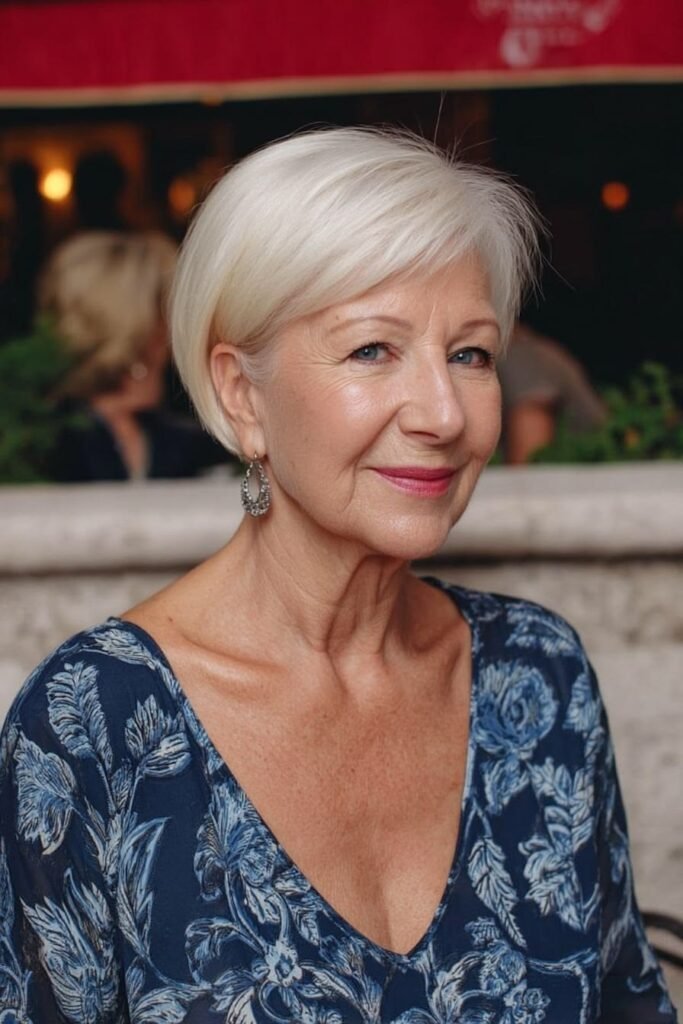 12. Platinum Sleek Pixie-Bob with Side-Swept Bangs