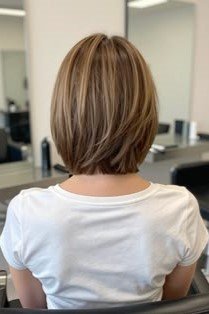 12. Straight Blunted Light Brown Bob with Subtle Layers