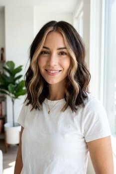 12. Wavy Medium-Length Dark Brunette Hair with Warm Golden Money Piece