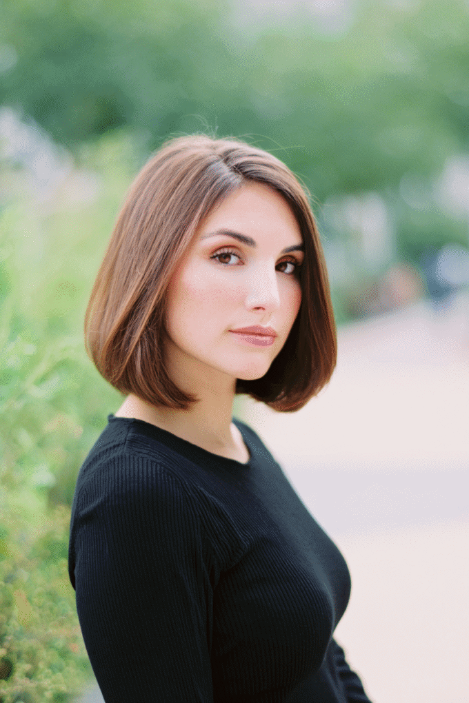 13. Classic Softly Curled Dark Brown Bob with Center Part