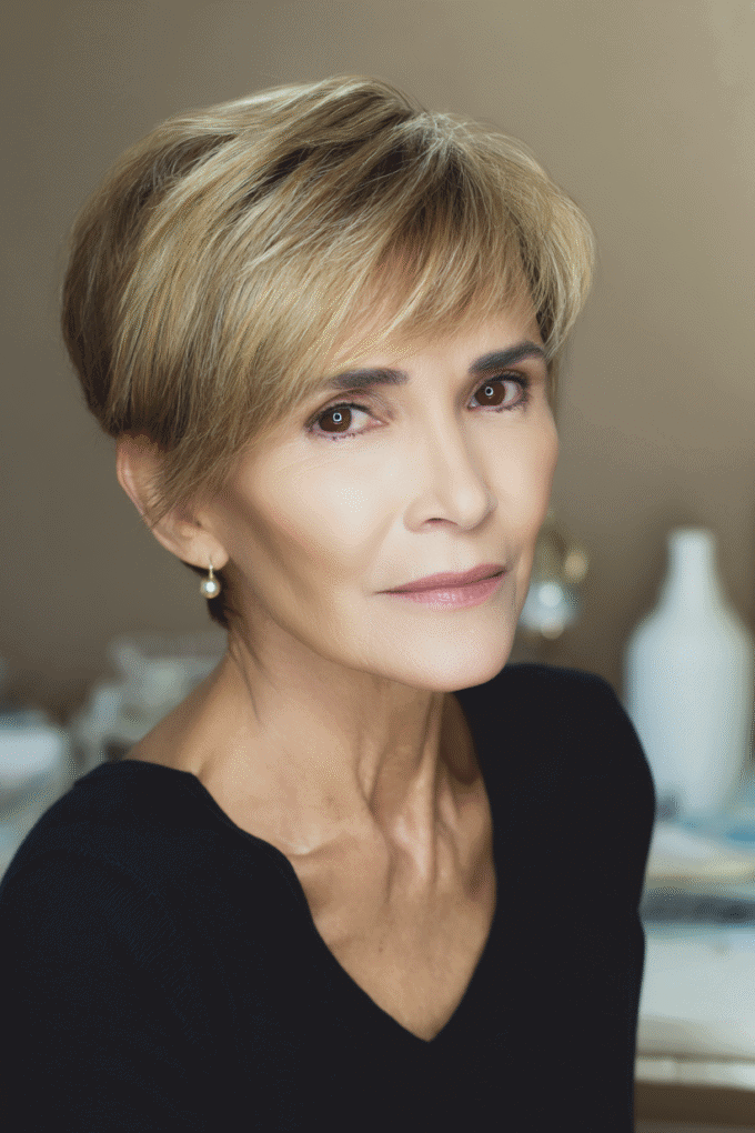 13. Neat Tapered Golden Blonde Pixie with Side Bangs