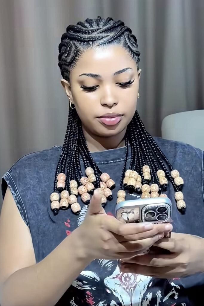 13. Short Fulani Braids with Wooden Beads and Curved Cornrows