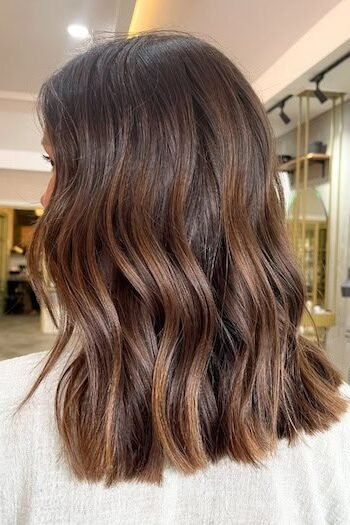 13. Textured Warm Chocolate Brown Lob with Soft Waves