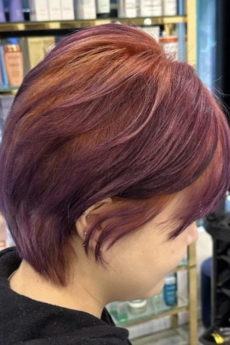 14. Side-Swept Plum and Copper Layered Pixie Bob