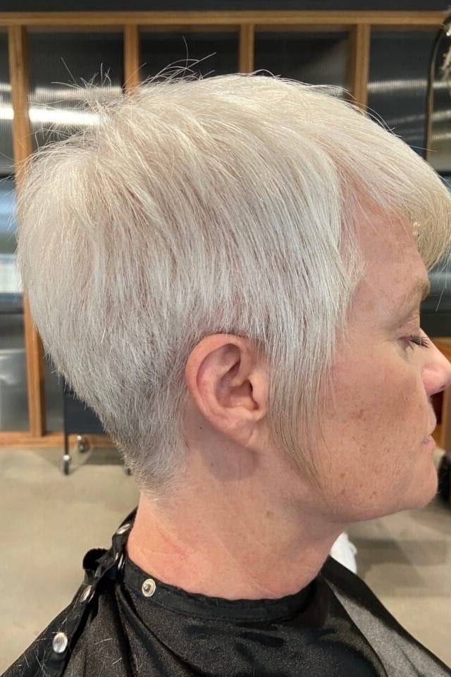 14. Ultra-Short Platinum Blonde Pixie Cut with Tapered Sides