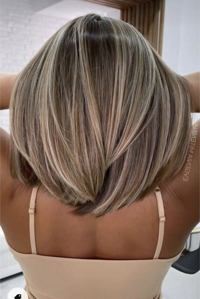 15. Back View of Straight Sleek Lob with Subtle Fine Highlights
