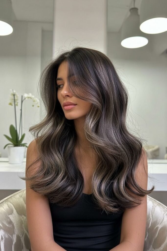 16. Dark Brown Hair with High-Contrast Ash Tone-on-Tone Balayage and Voluminous Curls