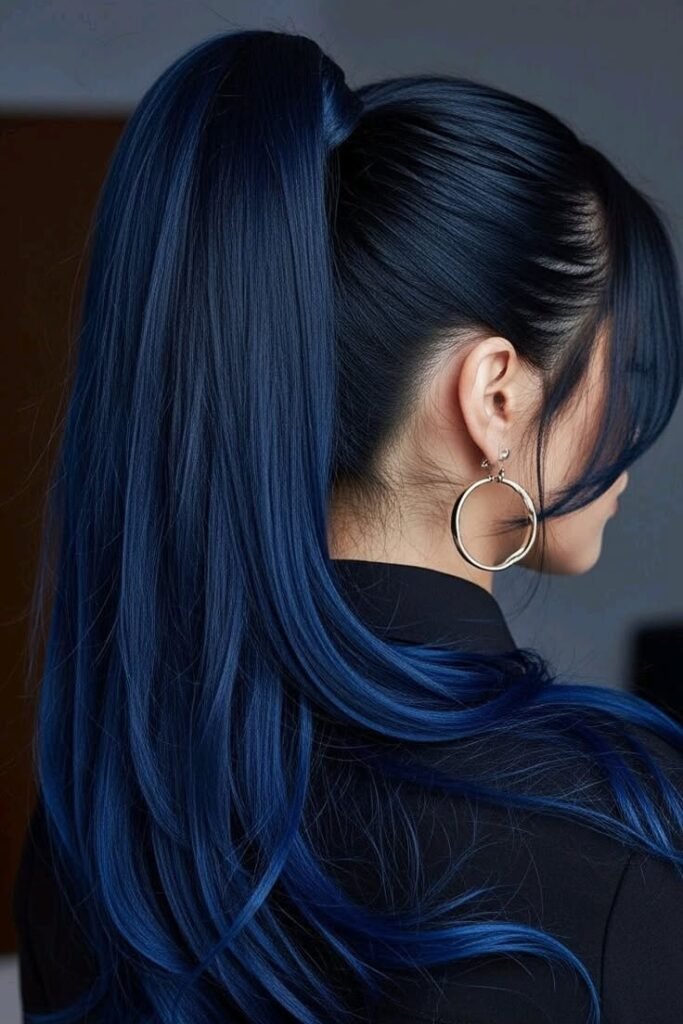 16. (Long Voluminous Brunette Hair with Metallic Sapphire Blue Balayage)