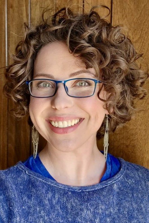 16. Soft Voluminous Curly Bob with Medium Layers