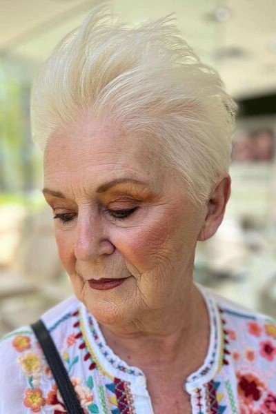 16. Upward Swept Platinum Pixie Cut