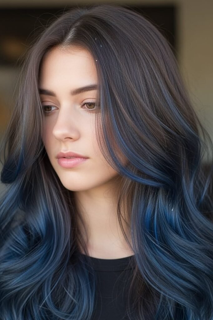 18. (Curly Brunette Hair with Vivid Blue Balayage Curls)
