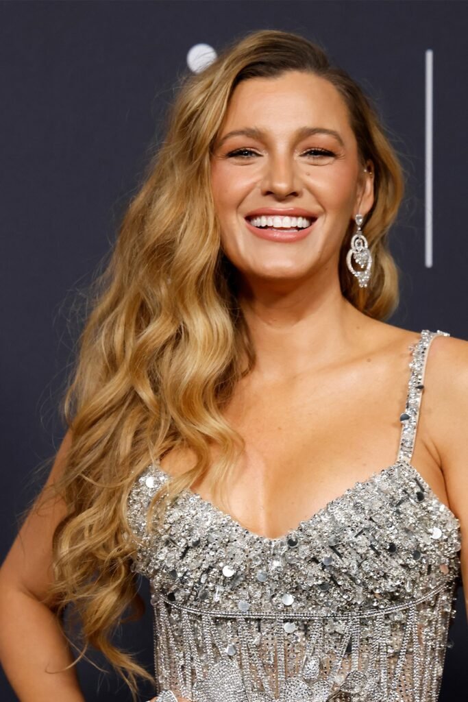 18. Glamorous Glam Side-Swept Cascading Waves