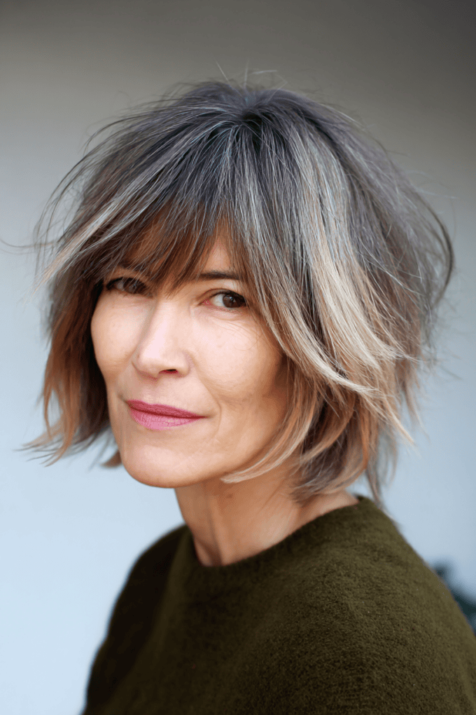 18. Shaggy Layered Grey Bob with Wispy Bangs