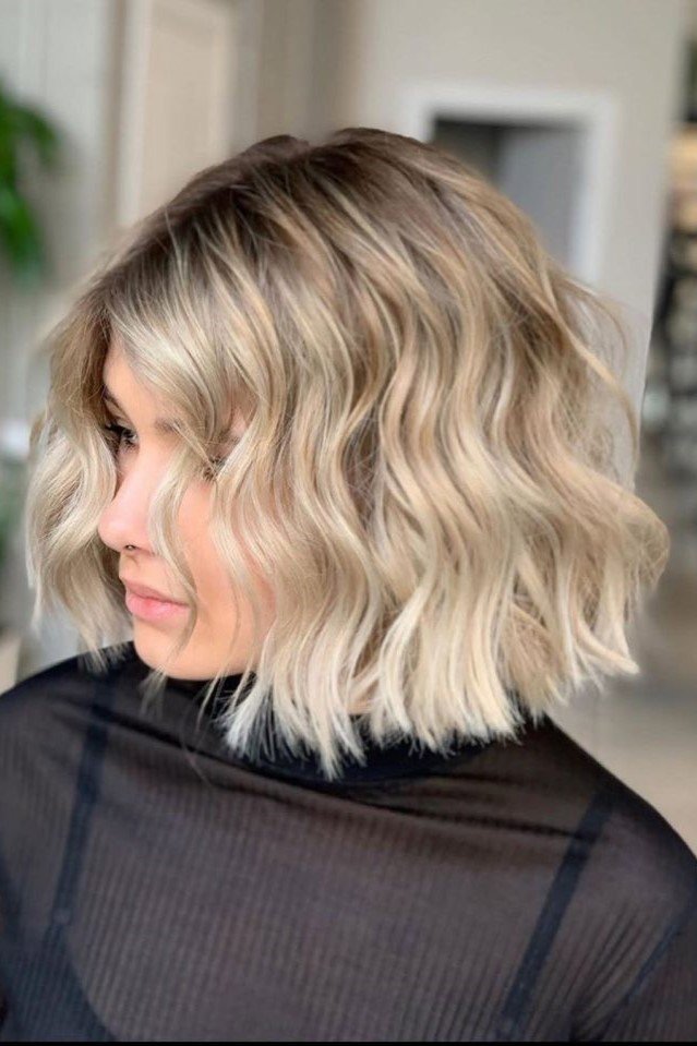 18. Textured Platinum Blonde Wavy Lob with Dark Roots