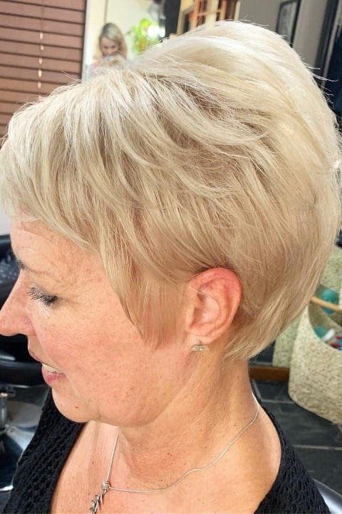 18. Voluminous Blonde Pixie Cut with Soft Feathered Layers