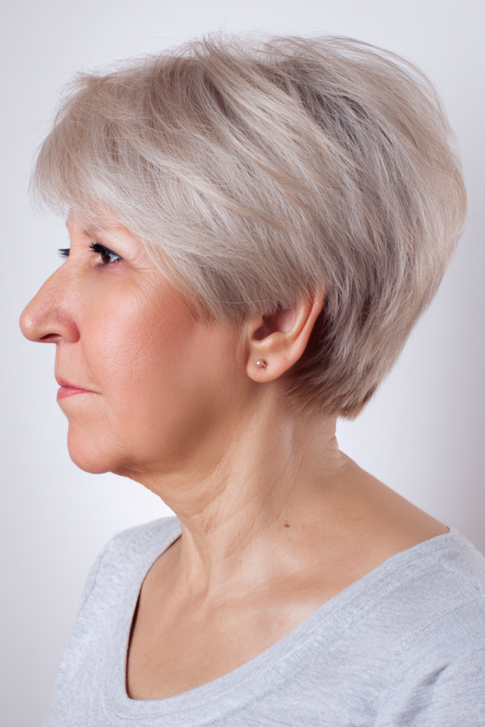 19. Classic Tapered Platinum Pixie Cut with Side-Swept Layers