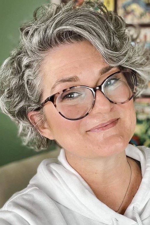19. Short Wavy Salt-and-Pepper Pixie Cut