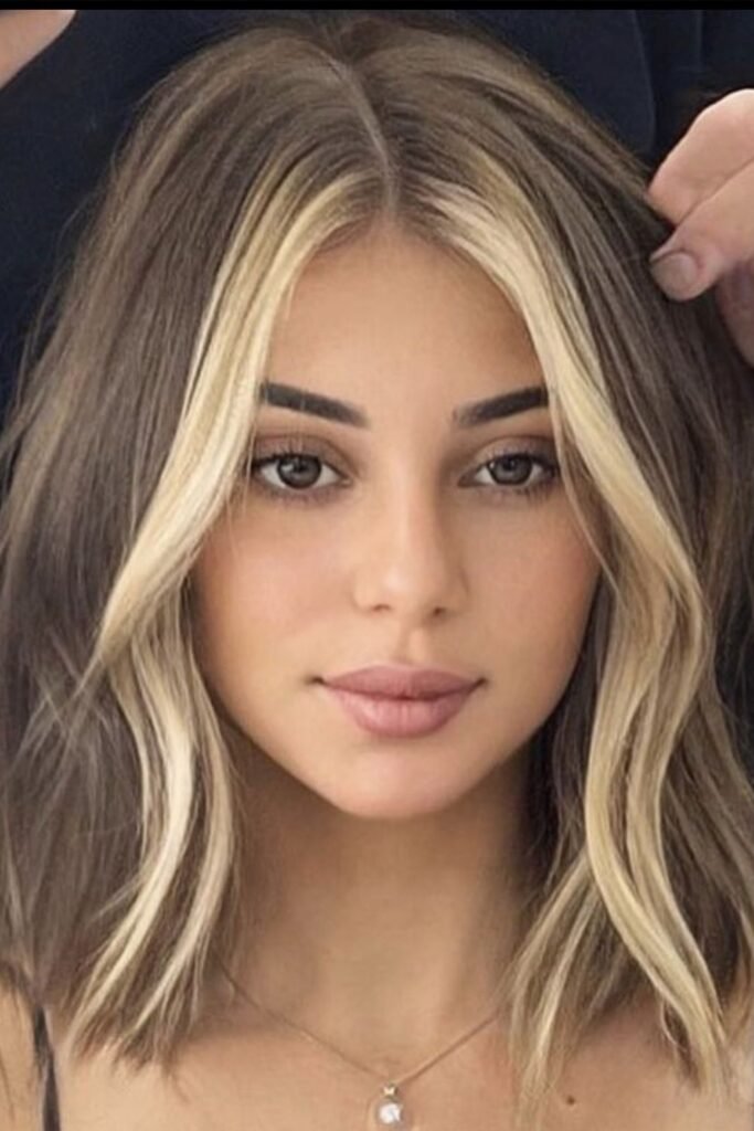 19. Soft Wavy Medium Brunette Hair with Bold Creamy Blonde Money Piece