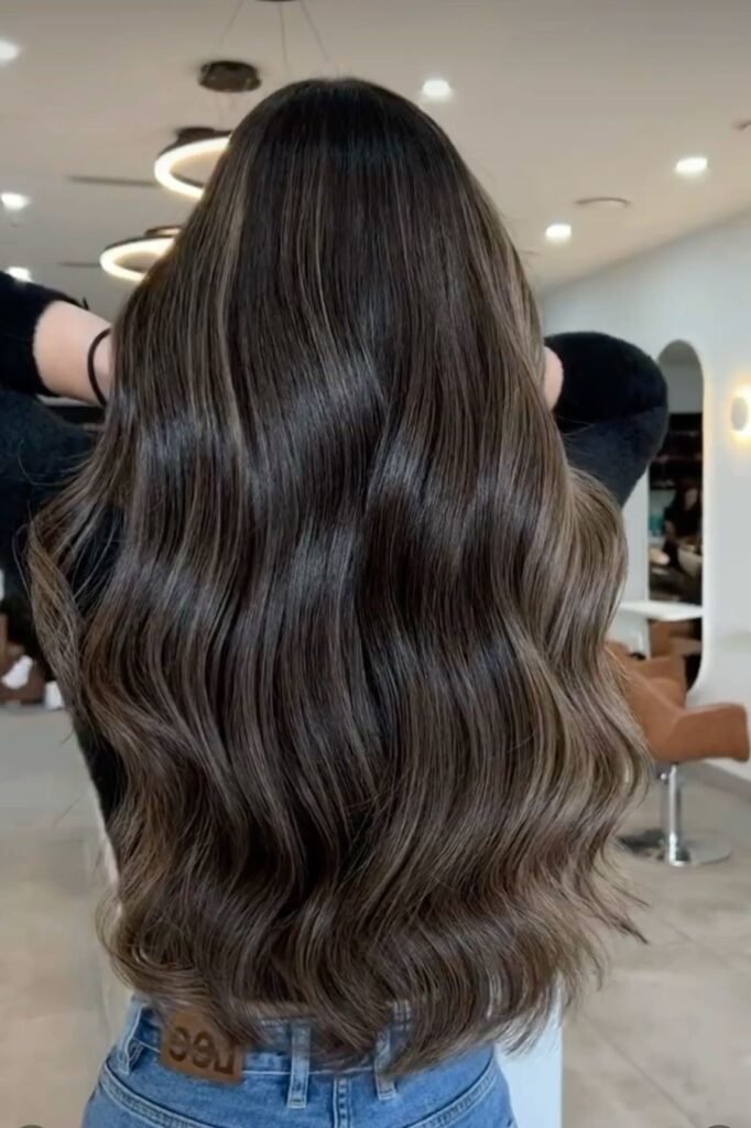 2. Deep Brown Hair with Seamless Ash Brunette Tone-on-Tone Balayage and Soft Waves