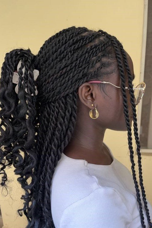 20. Half-Up Senegalese Twists with Claw Clip and Curly Ends