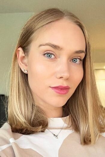 20. Sleek Center-Parted Light Golden Blonde Lob with Slightly Tucked Ends