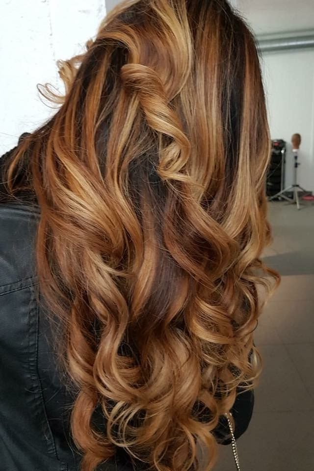 20. Voluminous Long Curls with Bright Golden Copper Balayage