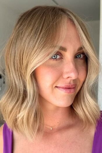 3. Soft Wavy Golden Blonde Lob with Center Part