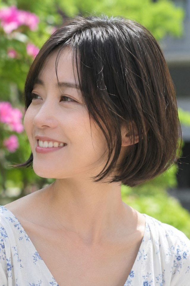 4. Sleek Softly Layered French Bob with Side-Swept Bangs