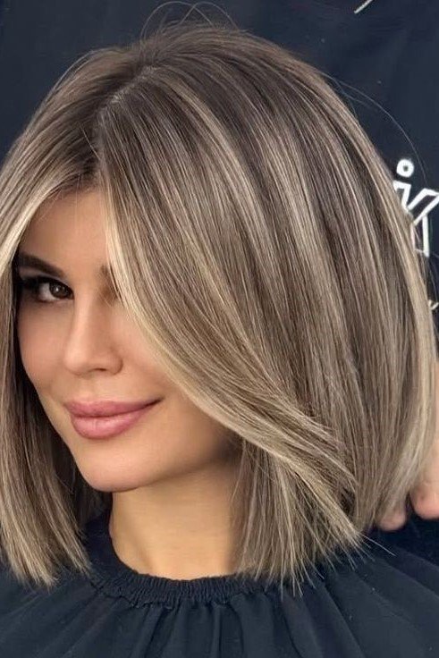 4. Straight Ash Blonde Bob with Face-Framing Money Pieces