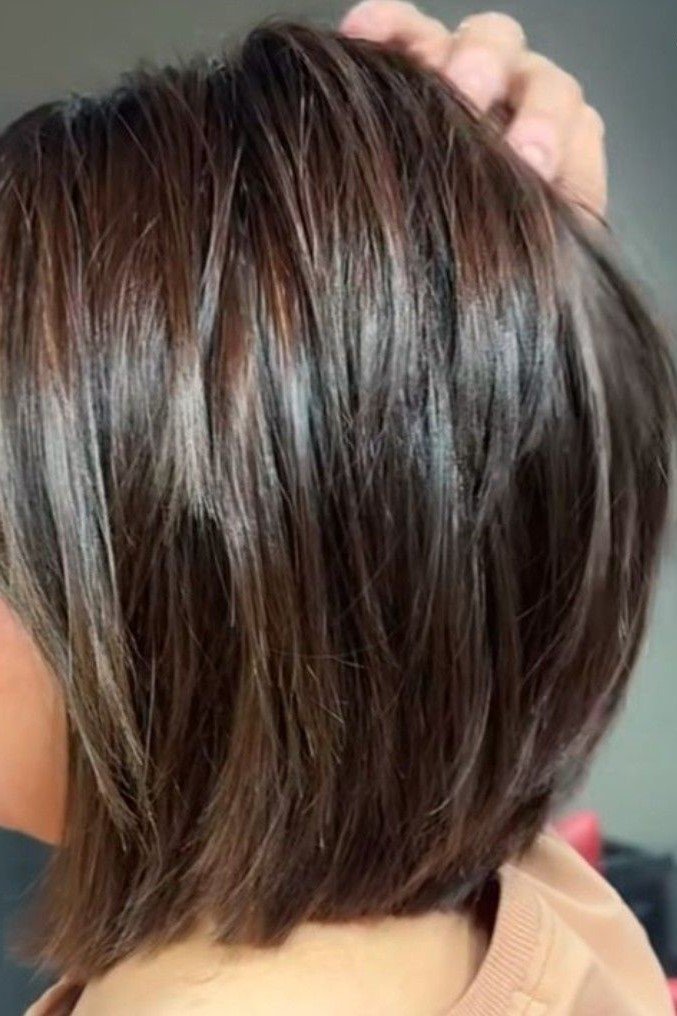 5. Sleek Brunette Short Layered Bob Cut