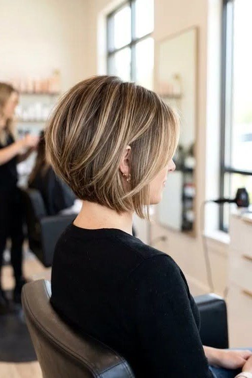 8. Classic Straight Blonde Stacked Bob with Face-Framing Strands