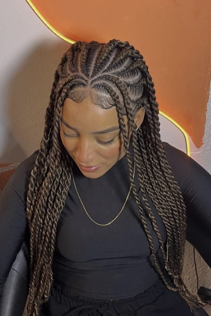 8. Middle-Parted Senegalese Twists with Heart Stitch Pattern