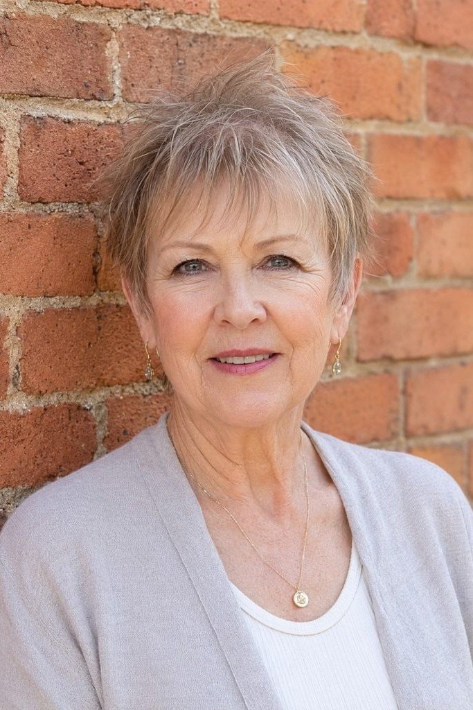 8. Short Spiky Silver Pixie Cut with Texturized Fringe