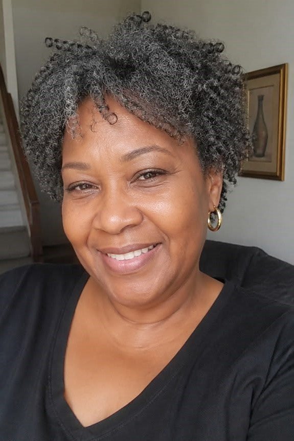 8. Short Tapered Cut with Curly Bangs