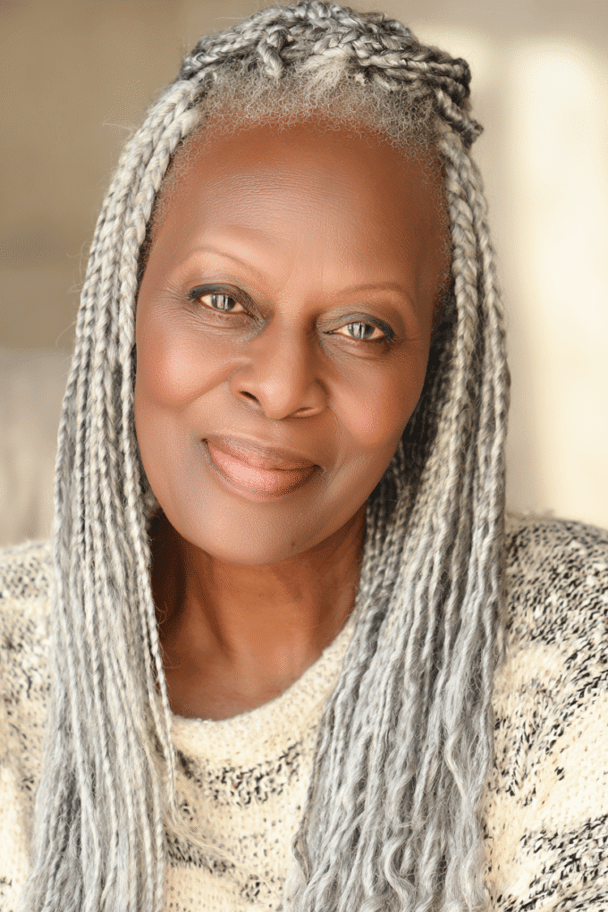8. Silver Grey Box Braids with Half-Up Top Knot