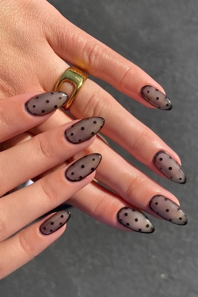 10. Smoky Sheer Black Nails with Dots
