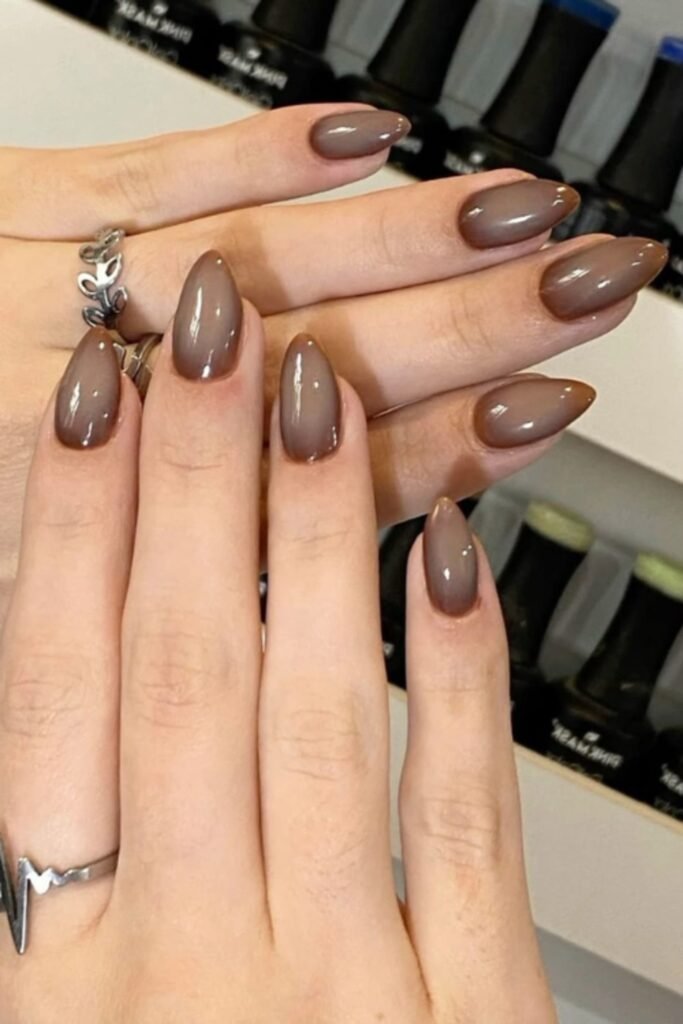 10. Olive and Rust Aura Nails with Brown Outline