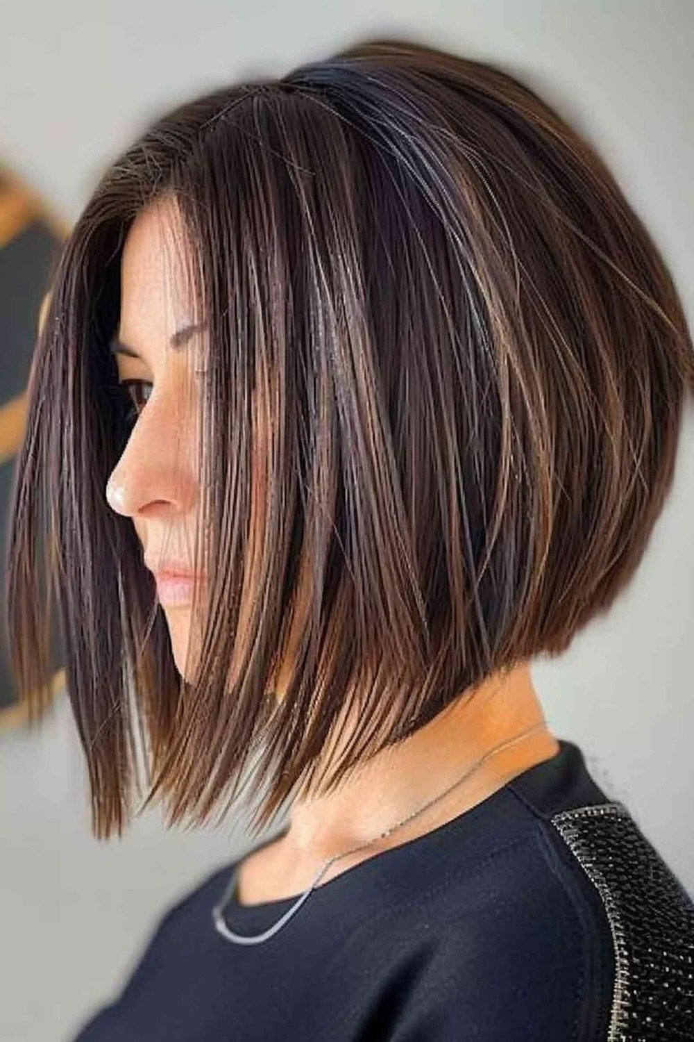 12. Soft Layered Bob with Brown Highlights