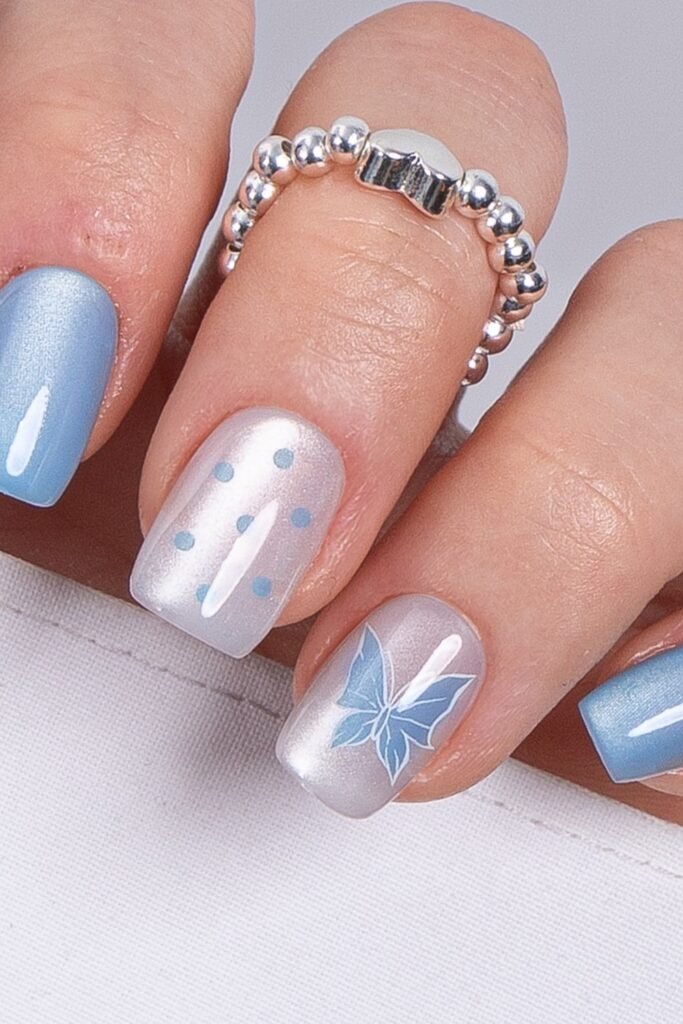 13. Icy Aura Nails with Silver Glitter