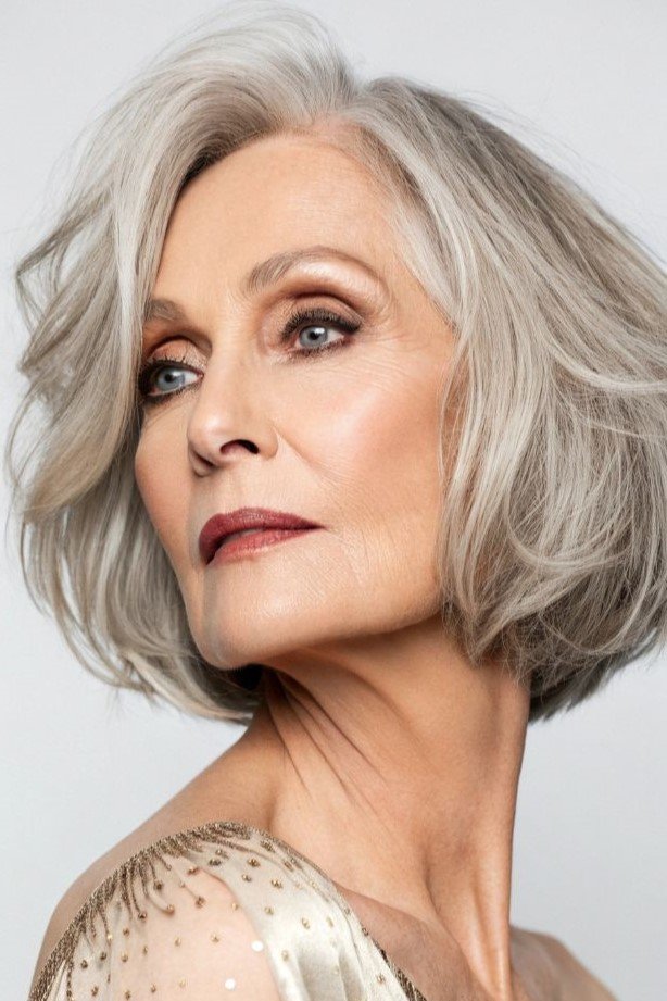 14. Elegant Silver Soft Rounded Bob with Side Sweep