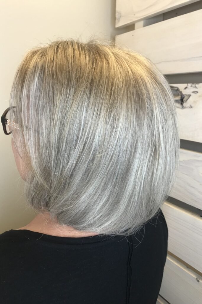 15. Gray Blending with Warm Blonde Highlights