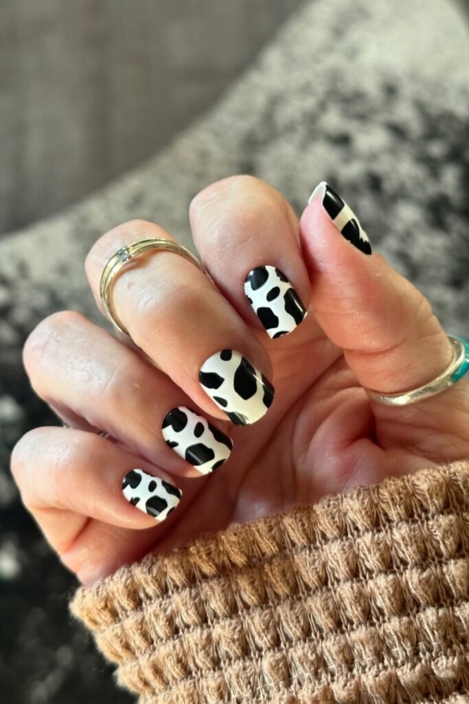 16. Matte Cow Print with Gold Swirl Lines