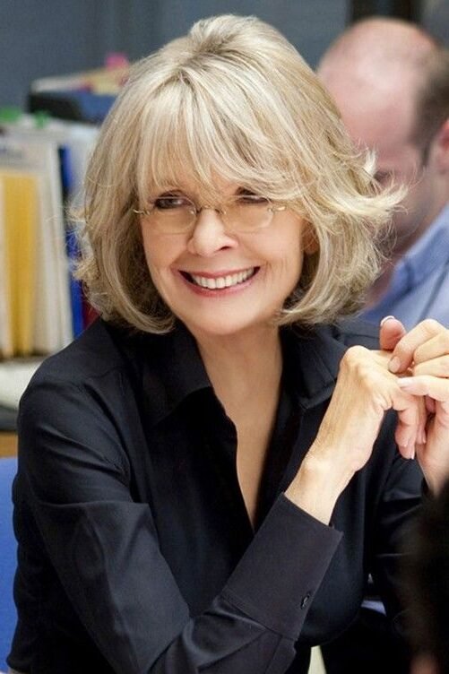 18. Layered Soft Bob with Curtain Bangs